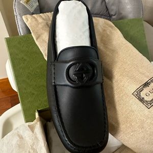 Men’s black Gucci loafers